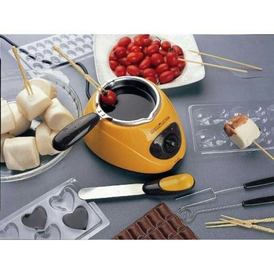 Chocolatiere Electric en acier inoxydable avec des moules 20W - Letshop.dz